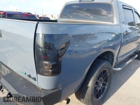 2011 Toyota Tundra 4WD Truck with VIN 5TFDW5F12BX181982, listed as a IAAI auction lot 42084985 with 222,356 mi miles. Bid and sale history available at carsss.com. Image 4.