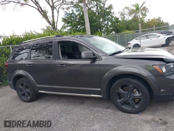 2020 Dodge Journey Crossroad with VIN 3C4PDCGB0LT270042, listed as a IAAI auction lot 40521806 with 102,934 mi miles and . Bid and sale history available at carsss.com. Image 13.