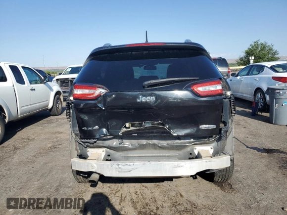 2014 Jeep Cherokee Latitude z VIN 1C4PJMCBXEW284645, wystawiony jako Copart lot #58838355 z przebiegiem 131 631 mil mil oraz Szkoda całkowita • Salvage title. Historia ofert i sprzedaży dostępna na DreamBid. Obrazek 6.