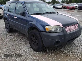 2005 Ford Escape XLS Value with VIN 1FMYU92Z95DA22100, listed as a Copart auction lot 57874705 with 192,057 mi miles and Salvage title. Bid and sale history available at DreamBid. Image 14.