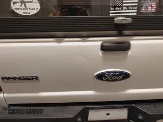 2010 Ford Ranger XLT with VIN 1FTLR4FE4APA76083, listed as a IAAI auction lot 39763204 with 180,324 mi miles and . Bid and sale history available at DreamBid. Image 21.