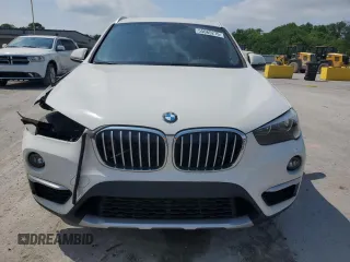 2018 BMW X1 sDrive28i z VIN WBXHU7C30J3H42992, wystawiony jako Copart lot #55065275 z przebiegiem 80 490 mil mil oraz Szkoda całkowita • Salvage title. Historia ofert i sprzedaży dostępna na DreamBid. Obrazek 5.