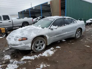 2002 Pontiac Bonneville SLE with VIN 1G2HY54K124116800, listed as a Copart auction lot 81102874 with 213,691 mi miles and Salvage Title. Bid and sale history available at carsss.com. Image 1.