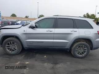 2016 Jeep Grand Cherokee Laredo z VIN 1C4RJFAG3GC457431, wystawiony jako IAAI lot #41993167 z przebiegiem 61 427 mil mil oraz . Historia ofert i sprzedaży dostępna na DreamBid. Obrazek 14.