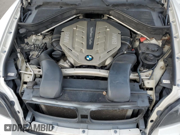 2011 BMW X6 50i with VIN 5UXFG8C51BLZ96811, listed as a Copart auction lot 75038764 with 0 mi miles and Salvage Title. Bid and sale history available at carsss.com. Image 12.