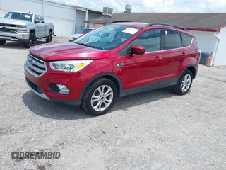 2017 Ford Escape SE z VIN 1FMCU0G95HUE86116, wystawiony jako IAAI lot #42397021 z przebiegiem 115 573 mil mil oraz . Historia ofert i sprzedaży dostępna na DreamBid. Obrazek 2.