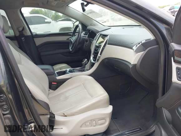 2014 Cadillac SRX Luxury Collection with VIN 3GYFNBE33ES599058, listed as a IAAI auction lot 42080556 with 128,917 mi miles. Bid and sale history available at carsss.com. Image 5.