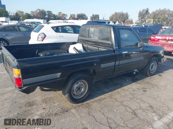 1987 Toyota Pickup with VIN JT4RN50R8H0277401, listed as a IAAI auction lot 42148719 with 239,923 mi miles and . Bid and sale history available at DreamBid. Image 4.