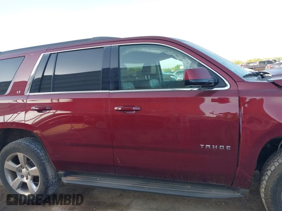 2016 Chevrolet Tahoe LT with VIN 1GNSKBKC7GR465751, listed as a IAAI auction lot 41983178 with 101,428 mi miles and . Bid and sale history available at DreamBid. Image 14.