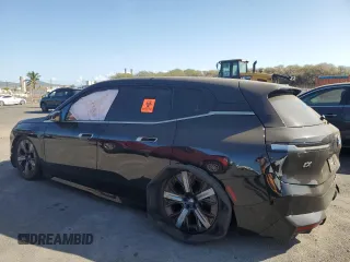 2022 BMW iX xDrive50 z VIN WB523CF04NCK19635, wystawiony jako Copart lot #44999765 z przebiegiem 28 141 mil mil oraz Szkoda całkowita • Salvage title. Historia ofert i sprzedaży dostępna na DreamBid. Obrazek 2.