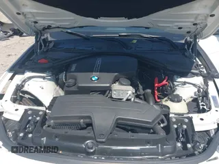 2014 BMW 3 Series 320i with VIN WBA3B1C51EK131063, listed as a IAAI auction lot 42043086 with 92,306 mi miles. Bid and sale history available at carsss.com. Image 10.