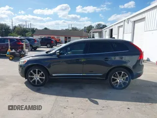 2015 Volvo XC60 T5 Drive-E Premier Plus with VIN YV440MDC7F2606774, listed as a IAAI auction lot 41564034 with 166,758 mi miles. Bid and sale history available at carsss.com. Image 14.