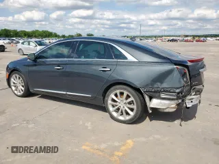 2013 Cadillac XTS Luxury with VIN 2G61P5S34D9244625, listed as a Copart auction lot 57832495 with 125,955 mi miles and Salvage title. Bid and sale history available at DreamBid. Image 2.