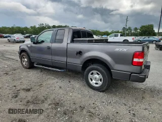 2005 Ford F-150 STX with VIN 1FTRX12W55FB32573, listed as a Copart auction lot 59602715 with 238,701 mi miles and Salvage title. Bid and sale history available at DreamBid. Image 2.