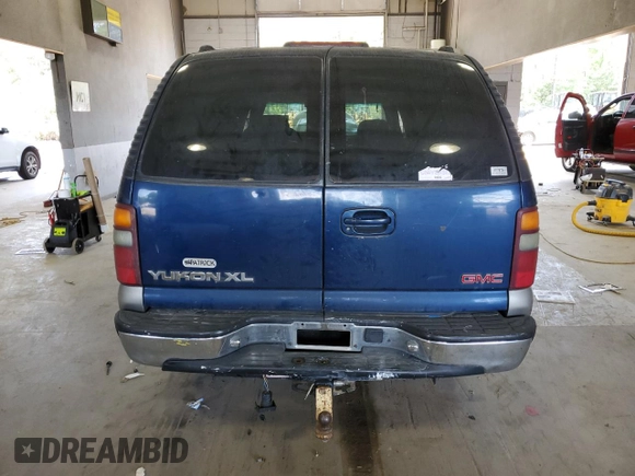 2000 GMC Yukon XL SLT with VIN 1GKFK16T1YJ125157, listed as a Copart auction lot 59906784 with 212,425 mi miles and Salvage Title. Bid and sale history available at carsss.com. Image 6.