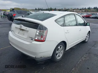 2004 Toyota Prius with VIN JTDKB20U940103988, listed as a IAAI auction lot 41946916 with 238,248 mi miles. Bid and sale history available at carsss.com. Image 4.