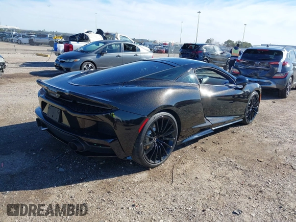 2020 McLaren GT with VIN SBM22GCA1LW000498, listed as a IAAI auction lot 41265247 with 18,465 mi miles. Bid and sale history available at carsss.com. Image 4.