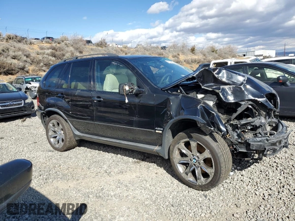 2005 BMW X5 4.8is with VIN 5UXFA93555LE83558, listed as a Copart auction lot 47374685 with 0 mi miles and Salvage Title. Bid and sale history available at carsss.com. Image 4.