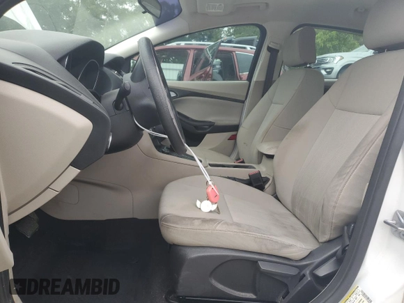 2015 Ford Focus SE with VIN 1FADP3F21FL246821, listed as a Copart auction lot 59732635 with 135,752 mi miles and Salvage title. Bid and sale history available at DreamBid. Image 7.