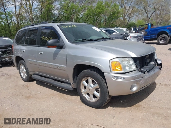 2005 GMC Envoy SLE z VIN 1GKDT13S852271545, wystawiony jako IAAI lot #42117632 z przebiegiem 213 355 mil mil oraz . Historia ofert i sprzedaży dostępna na DreamBid. Obrazek 1.