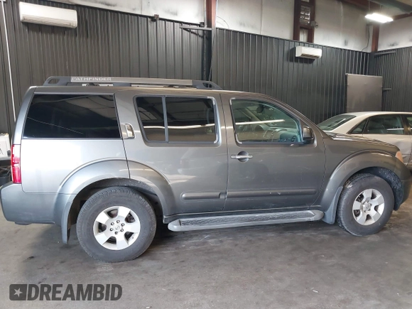 2005 Nissan Pathfinder SE with VIN 5N1AR18U95C730255, listed as a IAAI auction lot 41610769 with 154,252 mi miles. Bid and sale history available at carsss.com. Image 13.