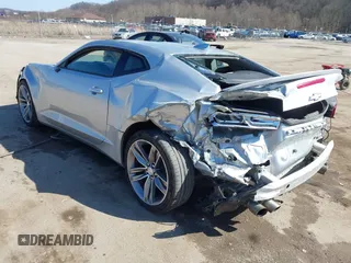 2018 Chevrolet Camaro 1LT with VIN 1G1FB1RS3J0149110, listed as a IAAI auction lot 41757802 with 58,795 mi miles and . Bid and sale history available at DreamBid. Image 3.