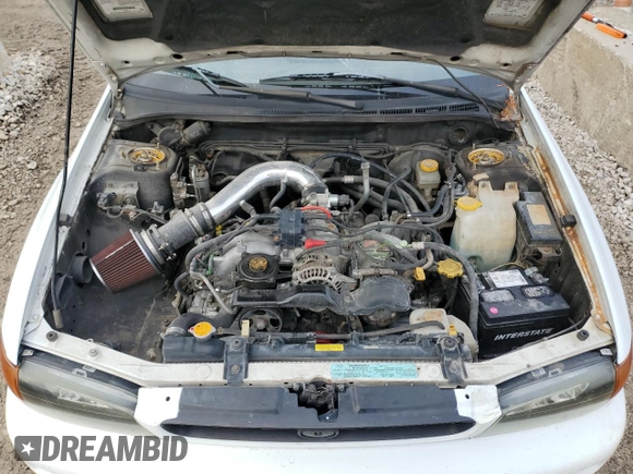 1999 Subaru Impreza L с VIN JF1GC4354XG500108, выставлен на аукционе Copart как лот 86786024 с пробегом 244 145 миль миль и Списание • Salvage title. История ставок и продаж доступна на DreamBid. Изображение 11.