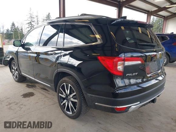2021 Honda Pilot Elite with VIN 5FNYF6H04MB043014, listed as a IAAI auction lot 41826931 with 63,546 mi miles and . Bid and sale history available at DreamBid. Image 3.