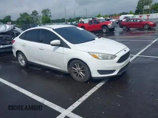 2015 Ford Focus SE with VIN 1FADP3F21FL289507, listed as a IAAI auction lot 42507172 with 16,149 mi miles and . Bid and sale history available at DreamBid. Image 1.