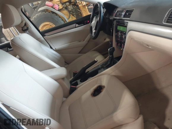 2014 Volkswagen Passat S with VIN 1VWAP7A34EC010664, listed as a IAAI auction lot 42471970 with 121,204 mi miles and . Bid and sale history available at DreamBid. Image 5.