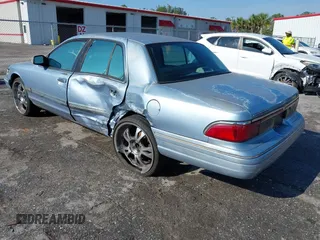1997 Mercury Grand Marquis LS with VIN 2MELM75W7VX708034, listed as a IAAI auction lot 41878938 with 197,818 mi miles and . Bid and sale history available at DreamBid. Image 3.