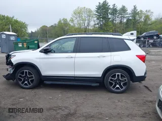 2023 Honda Passport Elite with VIN 5FNYF8H00PB022743, listed as a IAAI auction lot 42192958 with 25,165 mi miles and . Bid and sale history available at DreamBid. Image 14.
