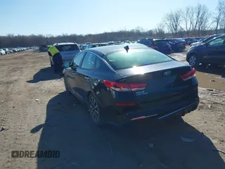 2019 Kia Optima S with VIN 5XXGT4L31KG355781, listed as a IAAI auction lot 41833796 with 130,804 mi miles. Bid and sale history available at carsss.com. Image 3.