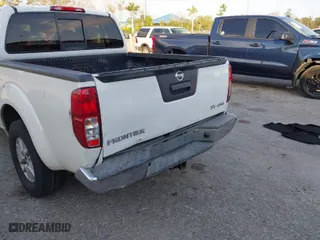 2016 Nissan Frontier SV with VIN 1N6AD0EV4GN795237, listed as a IAAI auction lot 41314288 with 169,396 mi miles. Bid and sale history available at carsss.com. Image 6.