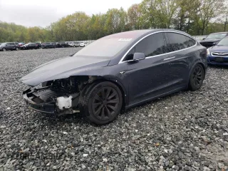 2016 Tesla Model X 70D z VIN 5YJXCBE23GF028267, wystawiony jako Copart lot #55570475 z przebiegiem 114 289 mil mil oraz Szkoda całkowita • Salvage title. Historia ofert i sprzedaży dostępna na DreamBid. Obrazek 1.