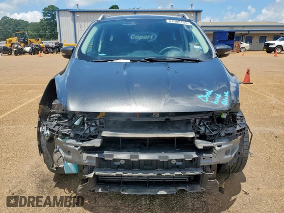 2015 Ford Escape Titanium with VIN 1FMCU0J92FUB80769, listed as a Copart auction lot 61988435 with 103,212 mi miles and Salvage title. Bid and sale history available at DreamBid. Image 5.