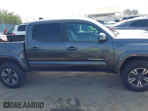 2017 Toyota Tacoma SR5 z VIN 3TMAZ5CN2HM047103, wystawiony jako IAAI lot #42344844 z przebiegiem 88 090 mil mil oraz . Historia ofert i sprzedaży dostępna na DreamBid. Obrazek 13.