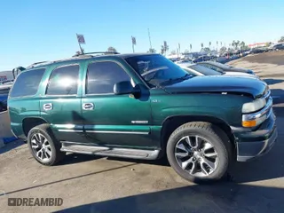 2002 Chevrolet Tahoe LS with VIN 1GNEC13T12R134174, listed as a IAAI auction lot 41233999 with 235,892 mi miles. Bid and sale history available at carsss.com. Image 13.