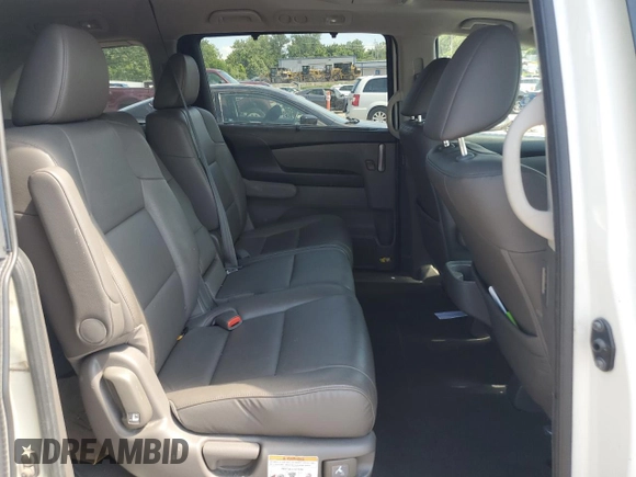 2013 Honda Odyssey Touring with VIN 5FNRL5H99DB052538, listed as a Copart auction lot 66310875 with 192,052 mi miles and Clean title. Bid and sale history available at DreamBid. Image 11.