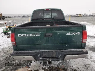 2002 Dodge Dakota SLT с VIN 1B7HG48N12S614309, выставлен на аукционе Copart как лот 87309554 с пробегом 287 994 миль миль и Списание • Salvage title. История ставок и продаж доступна на DreamBid. Изображение 6.