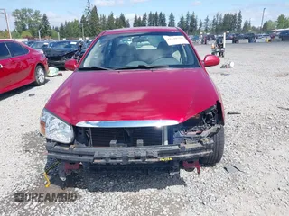 2009 Kia Spectra EX with VIN KNAFE222195661572, listed as a IAAI auction lot 42148750 with 137,773 mi miles. Bid and sale history available at carsss.com. Image 6.