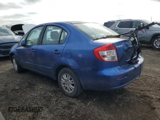2012 Suzuki SX4 LE with VIN JS2YC5A35C6303573, listed as a Copart auction lot 84844564 with 0 mi miles and Clean Title. Bid and sale history available at carsss.com. Image 2.