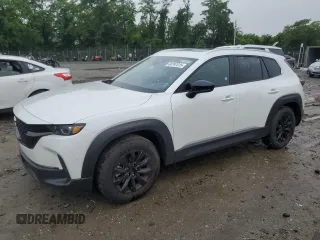 2025 Mazda CX-50 S Premium z VIN 7MMVABDM9SN331032, wystawiony jako Copart lot #60797015 z przebiegiem 9 572 mil mil oraz Nie do naprawy • Non repairable. Historia ofert i sprzedaży dostępna na DreamBid. Obrazek 1.