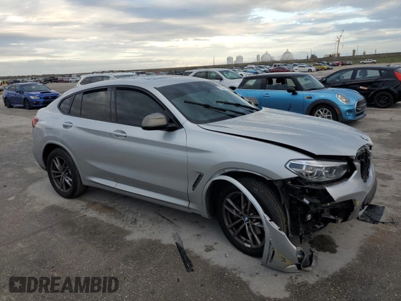 2021 BMW X4 M40i with VIN 5UX2V5C07M9G03839, listed as a Copart auction lot 79852123 with 0 mi miles. Bid and sale history available at carsss.com. Image 4.