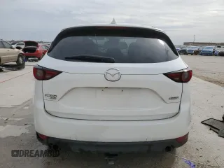 2017 Mazda CX-5 Grand Touring with VIN JM3KFBDL8H0209075, listed as a Copart auction lot 47991735 with 209,743 mi miles and Salvage Title. Bid and sale history available at carsss.com. Image 6.
