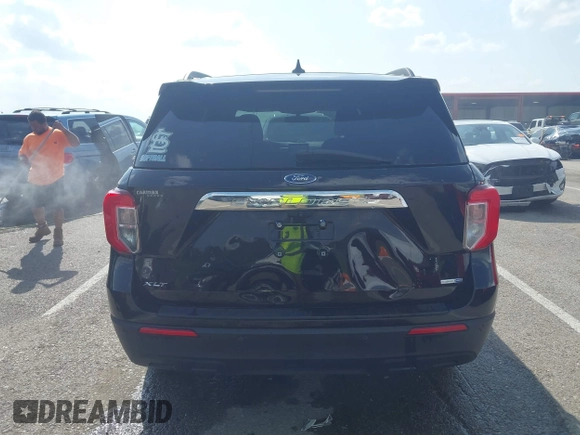 2020 Ford Explorer XLT z VIN 1FMSK8DH7LGB27949, wystawiony jako IAAI lot #42120602 z przebiegiem 64 186 mil mil oraz . Historia ofert i sprzedaży dostępna na DreamBid. Obrazek 16.