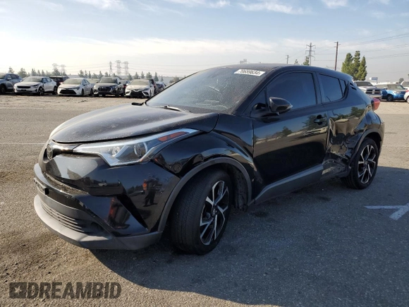 2018 Toyota C-HR XLE with VIN NMTKHMBX7JR022593, listed as a Copart auction lot 70659634 with 106,692 mi miles and Salvage Title. Bid and sale history available at carsss.com. Image 1.