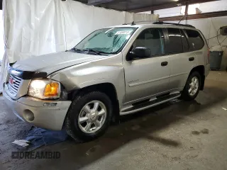 2006 GMC Envoy SLE with VIN 1GKDT13S562332884, listed as a Copart auction lot 51469015 with 69,488 mi miles and Salvage Title. Bid and sale history available at carsss.com. Image 1.