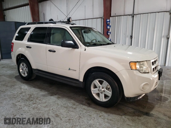 2011 Ford Escape Hybrid with VIN 1FMCU4K35BKC23461, listed as a Copart auction lot 73209354 with 3,888 mi miles and Clean title. Bid and sale history available at DreamBid. Image 4.