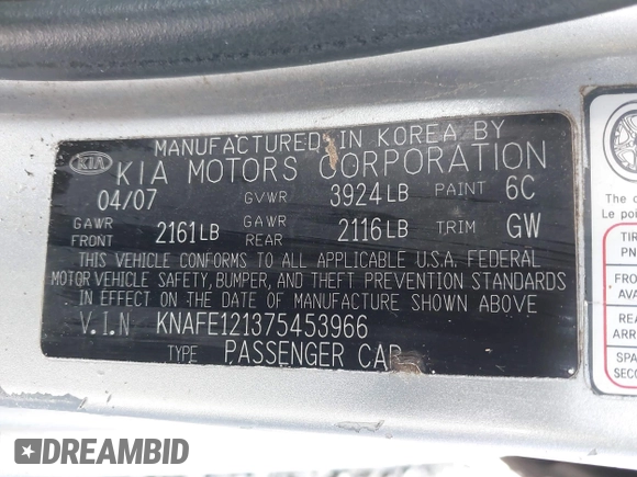 2007 Kia Spectra EX with VIN KNAFE121375453966, listed as a IAAI auction lot 41775758 with 211,586 mi miles. Bid and sale history available at carsss.com. Image 9.